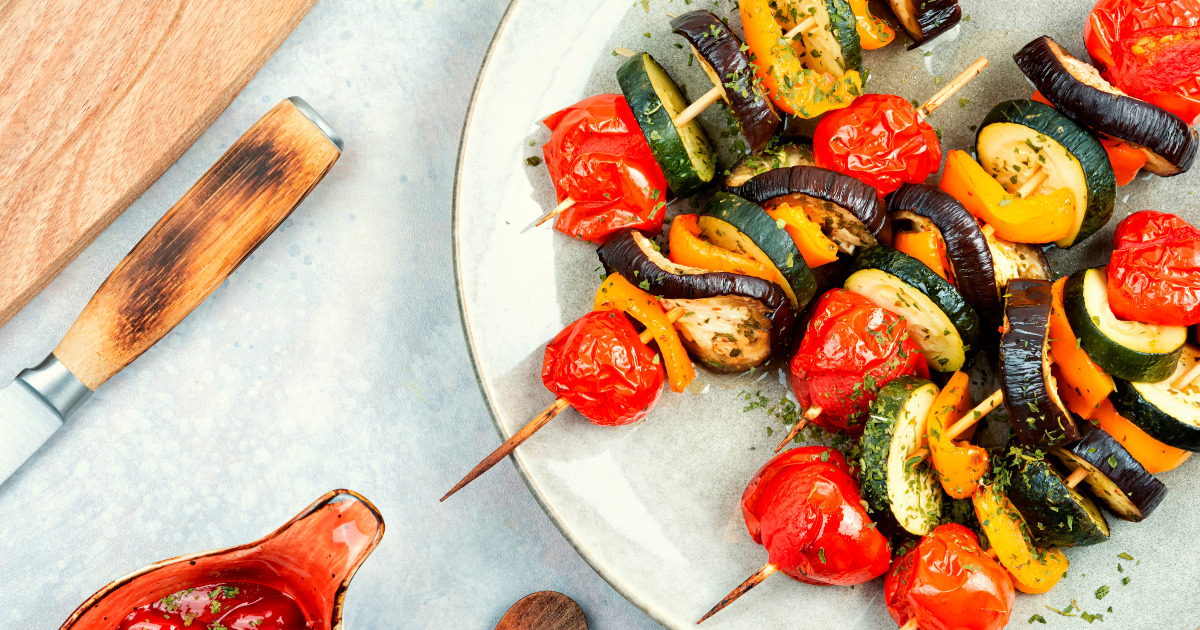 Vegan kabobs - grilled veggies on a wooden stick.