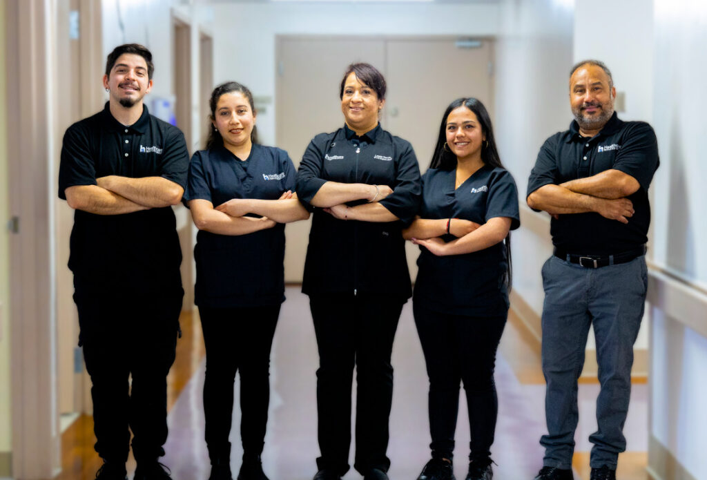Diverse team of smiling HCSG staff members in a healthcare setting. Dedicated and professional support services from Healthcare Services Group.