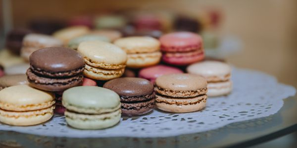 A carton of a dozen brown eggs.